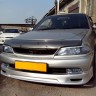 Накладка на передний бампер Toyota Carina (210) Рестайлинг купить недорого с доставкой в Бор